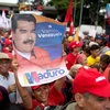 Người dân biểu tình ủng hộ Tổng thống Venezuela Nicolas Maduro tại Caracas. (Nguồn: Associated Press)