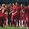 Niềm vui của các cầu thủ Olympic Việt Nam sau khi Nguyễn Công Phượng ghi bàn thắng vào lưới Olympic Bahrain trong trận đấu tại ASIAD 2018 ở Bekasi, Indonesia ngày 23/8. (Ảnh: AFP/TTXVN)