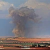 Khói bốc lên sau một cuộc không kích gần làng Kafr Ain, tỉnh Idlib, Syria ngày 7/9. (Ảnh: AFP/TTXVN)