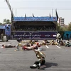 Hiện trường vụ tấn công nhằm vào lễ diễu binh ở thành phố Ahvaz, Iran ngày 22/9/2018. *Ảnh: AFP/TTXVN)