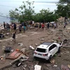 Hình ảnh tang thương sau vụ động đất-sóng thần kinh hoàng ở Indonesia