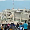 Một tòa nhà bị đổ sập sau trận động đất kèm theo sóng thần ở Sulawesi, Indonesia ngày 30/9/2018. (Ảnh: AFP/TTXVN)