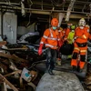 Lực lượng cứu hộ tìm kiếm nạn nhân sau thảm họa động đất và sóng thần ở Palu, tỉnh Trung Sulawesi, Indonesia ngày 3/10/2018. (Ảnh: THX/TTXVN)