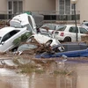 Ôtô dồn thành đống sau lũ lụt tại đảo nghỉ dưỡng Majorca. (Nguồn: EPA)