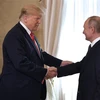 Tổng thống Mỹ Donald Trump (thứ 2, trái) và người đồng cấp Nga Vladimir Putin (phải) trong cuộc gặp thượng đỉnh tại Helsinki, Phần Lan ngày 16/7/2018. (Ảnh: AFP/TTXVN)