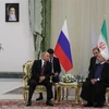 Tổng thống Iran Hassan Rouhani (phải) trong cuộc hội đàm với Tổng thống Nga Vladimir Putin (trái) đang ở thăm Tehran ngày 7/9/2018. (Ảnh: AFP/ TTXVN)