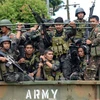 Binh sỹ Philippines tuần tra tại Marawi , đảo Mindanao, miền nam Philippines. (Nguồn: AFP/TTXVN)