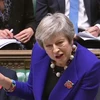Thủ tướng Anh Theresa May (giữa) tại cuộc họp của Hạ viện Anh ở London, ngày 31/10. (Ảnh: AFP/TTXVN)