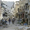 Cảnh tàn phá sau các cuộc xung đột ở Damascus, Syria ngày 3/11. (Ảnh: AFP/TTXVN)