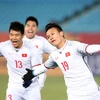 Tuyển U23 Việt Nam trong trang phục trắng đã lập nên kỳ tích khi đánh bại U23 Qatar ở Vòng chung kết U23 châu Á. (Ảnh: Nguyên Vũ-Huy Anh/TTXVN)