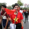 [Photo] Cổ động viên náo nức trước trận quyết đấu Việt Nam-Malaysia