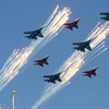 Máy bay Su-27 và MiG-29 của Nga tham gia diễu binh nhân ngày Chiến thắng 9/5 tại Moskva. (Nguồn: AFP/TTXVN)