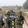 Binh sỹ Thổ Nhĩ Kỳ tại trạm kiểm soát an ninh ở Afrin, Syria ngày 20/3. (Nguồn: THX/TTXVN)