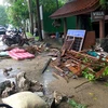 Cảnh tàn phá sau khi sóng thần ập vào bãi biển Carita, Indonesia ngày 23/12/2018. (Ảnh: AFP/TTXVN)