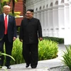 Tổng thống Mỹ Donald Trump (trái) và nhà lãnh đạo Triều Tiên Kim Jong-un. (Ảnh: AFP/TTXVN)
