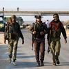 Các tay súng nổi dậy tại khu vực Morek, Syria. (Ảnh: AFP/TTXVN)