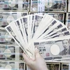 Đồng yen sẽ dần biến mất trong xã hội không dùng tiền mặt của Nhật Bản. (Nguồn: EPA/TTXVN)