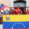 Tổng thống Venezuela Nicolas Maduro (giữa) phát biểu trong cuộc míttinh ủng hộ Chính phủ của ông tại Caracas, Venezuela, ngày 23/1/2019. (Ảnh: THX/TTXVN)