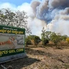 Khói bay lên không trung sau khi đám cháy bùng phát tại Khu bảo tồn hổ Bandipur ở Karnataka ngày 23/2. (Nguồn: PTI)