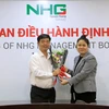 Phó giáo sư-tiến sỹ Thái Bá Cần, Phó Tổng Giám đốc phát triển đại học NHG (trái) sẽ đảm nhiệm vị trí Giám đốc Ban Đại học NHG kiêm nhiệm Phó Chủ tịch thường trực của Hội đồng Đại học. (Ảnh: PV/Vietnam+)