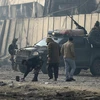 Nhân viên an ninh điều tra tại hiện trường vụ đánh bom ở Kabul ngày 15/1. (Ảnh: AFP/TTXVN) 