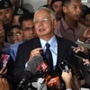 Cựu Thủ tướng Malaysia Najib Razak (giữa) tại tòa án ở Kuala Lumpur ngày 20/9/2018. (Ảnh: AFP/TTXVN)