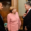 Tổng thống Pháp Emmanuel Macron, Thủ tướng Đức Angela Merkel và Tổng thống Ukraine Petro Potroshenko. (Nguồn: president.gov.ua)