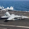 Chiến đấu cơ Super Hornet F/A-18F hạ cánh trên tàu sân bay USS Abraham Lincoln của Hải quân Mỹ ở Vịnh Oman ngày 22/5. (Nguồn: Reuters)