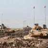 Binh sỹ Thổ Nhĩ Kỳ tham gia cuộc diễn tập tại cửa khẩu Habur ở biên giới Thổ Nhĩ Kỳ-Iraq. (Nguồn: AFP/TTXVN)