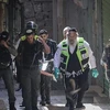 Lực lượng chức năng Israel chuyển thi thể nạn nhân bị một người đàn ông Palestine đâm chết ở Jerusalem. (Nguồn: timesofisrael.com)