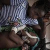 Bệnh nhân nhiễm HIV điều trị tại bệnh viện ở Bangui, CH Trung Phi. (Ảnh: AFP/TTXVN)