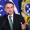 Tổng thống Brazil Jair Bolsonaro công bố kế hoạch kích thích kinh tế tại Brasilia ngày 24/7/2019. (Ảnh: AFP/ TTXVN)