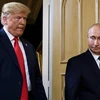 Tổng thống Mỹ Donald Trump (trái) và Tổng thống Nga Vladimir Putin. (Ảnh: AFP/TTXVN)