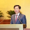 Tổng Thanh tra Chính phủ Lê Minh Khái, thừa ủy quyền của Thủ tướng Chính phủ trình bày Báo cáo về công tác phòng, chống tham nhũng năm 2019. (Ảnh: Doãn Tấn/TTXVN)