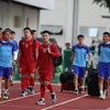 Đội tuyển U22 Việt Nam bước vào sân Rizal Memorial. (Ảnh: Hoàng Linh/TTXVN)