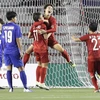 Hải Yến (số 12) cùng đồng đội ăn mừng sau khi đánh đầu ghi bàn mở tỷ số cho tuyển nữ Việt Nam. (Ảnh: Hoàng Linh/ TTXVN)