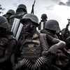 Binh sỹ quân đội CHDC Congo trong chiến dịch truy quét phiến quân Hồi giáo ở Oicha. (Ảnh:AFP/TTXVN)