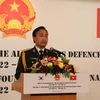 Tùy viên Quốc phòng Việt Nam tại Hàn Quốc, Đại tá Đinh Hùng Tuấn, phát biểu khai mạc buổi lễ. (Ảnh: Hữu Tuyên/TTXVN)