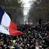 Người dân tham gia biểu tình phản đối kế hoạch cải cách chính sách hưu trí tại Paris, Pháp ngày 17/12/2019. (Ảnh: AFP/TTXVN)