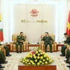 Đại tướng Ngô Xuân Lịch tiếp Thống tướng Min Aung Hlaing, Tổng Tư lệnh các lực lượng vũ trang Myanmar. (Ảnh: Dương Giang/TTXVN)