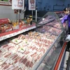Khách hàng mua sắm tại siêu thị Big C Lê Trọng Tấn. (Ảnh: Trần Việt/TTXVN)