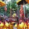Lễ rước cỏ voi của người dân thôn Xuân Tảo, xã Xuân Giang. (Ảnh: Quang Quyết/TTXVN)