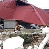 Nhà cửa bị phá hủy trong trận động đất tại Ambon, Maluku, Indonesia, ngày 27/9/2019. (Ảnh: AFP/TTXVN)