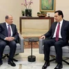 Tổng thống Liban Michel Aoun (trái) và Thủ tướng Hassan Diab (phải) tại cuộc gặp ở thủ đô Beirut ngày 21/1/2020. (Ảnh: THX/TTXVN)