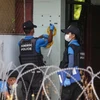 Cảnh sát điều tra tại hiện trường một vụ tấn công ở Pattani, miền nam Thái Lan, ngày 24/7/2019. (Ảnh: AFP/TTXVN)