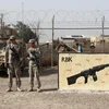 Binh sỹ Mỹ và Iraq trong một buổi huấn luyện tại căn cứ không quân Taji - nơi cũng vừa bị tấn công bằng tên lửa Katyusha ngày 14/1. (Ảnh: AFP/TTXVN)