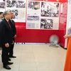 Các đồng chí lãnh đạo tỉnh tham quan triển lãm chuyên đề “90 năm dưới lá cờ vẻ vang của Đảng”. (Nguồn: thuathienhue.gov.vn)