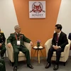 Thứ trưởng Nguyễn Chí Vịnh làm việc với Quốc vụ khanh Quốc phòng Singapore Heng Chee How ngày 11/2. (Ảnh: Bảo Trung/TTXVN)