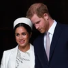 Hoàng tử Anh Harry (phải) và Công nương Meghan Markle (trái) sau khi tham dự một sự kiện ở London ngày 11/3/2019. (Ảnh: AFP/TTXVN)