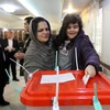 Cử tri bỏ phiếu tại điểm bầu cử ở Tehran, Iran ngày 21/2/2020. (Ảnh: AFP/TTXVN)